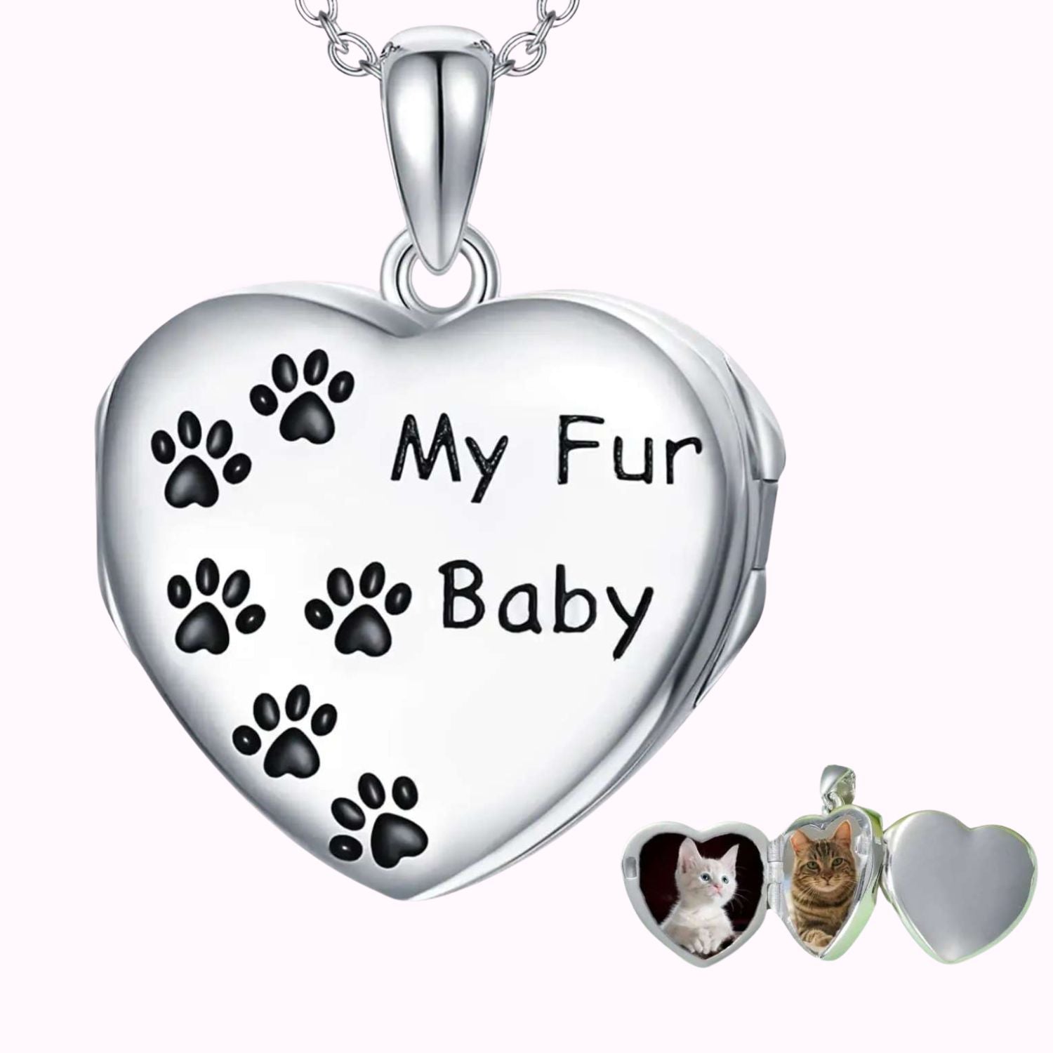 Relicario de plata con forma de corazón con huellas negras, para guardar 4 fotos de tus perros o gatos de TOUS