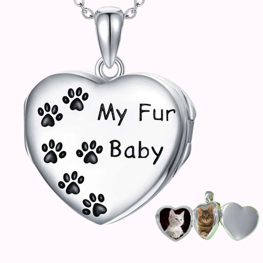 Relicario de plata con forma de corazón con huellas negras, para guardar 4 fotos de tus perros o gatos de TOUS