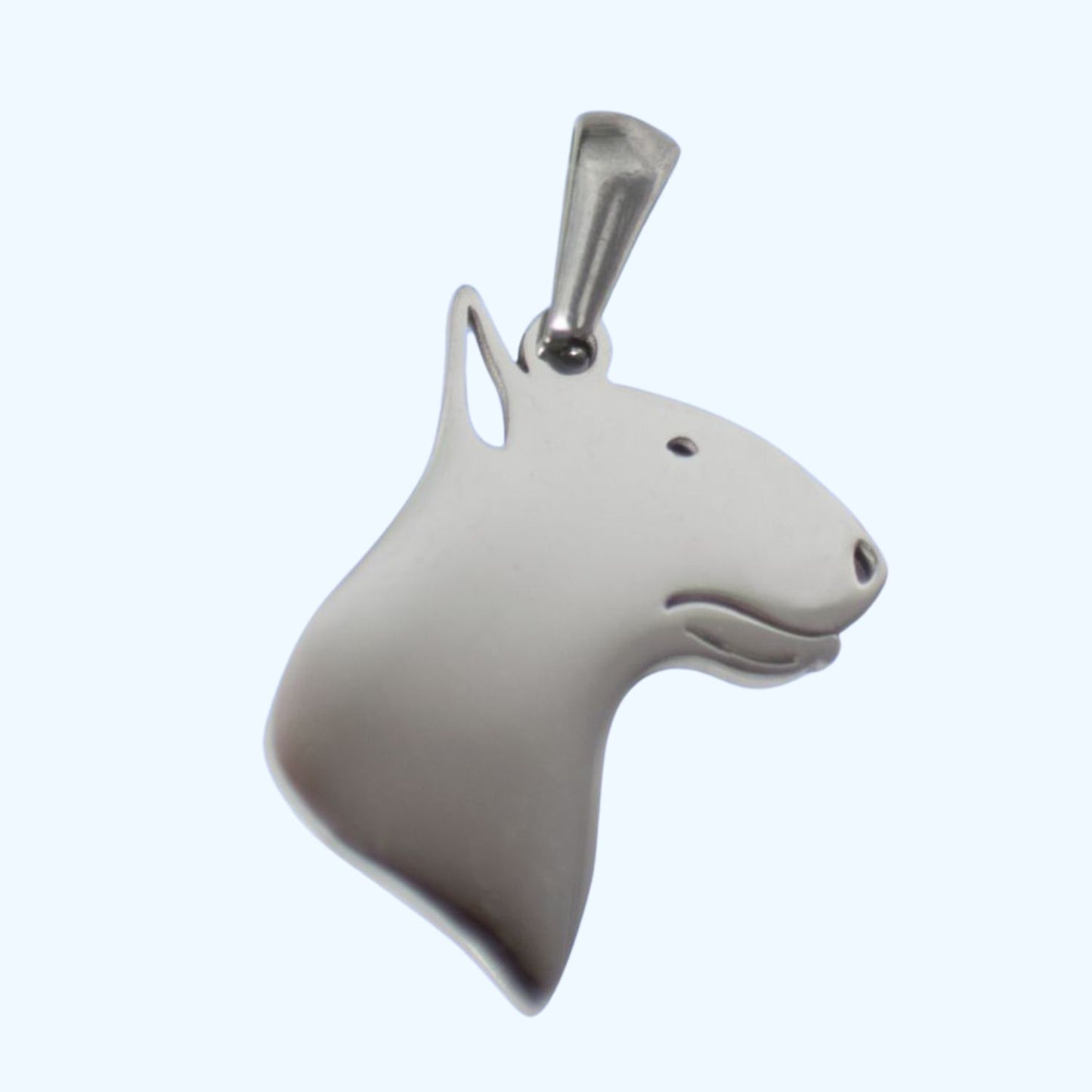 Colgante con forma de perrito bull terrier de acero, para niña, sobre fondo azul de TOUS