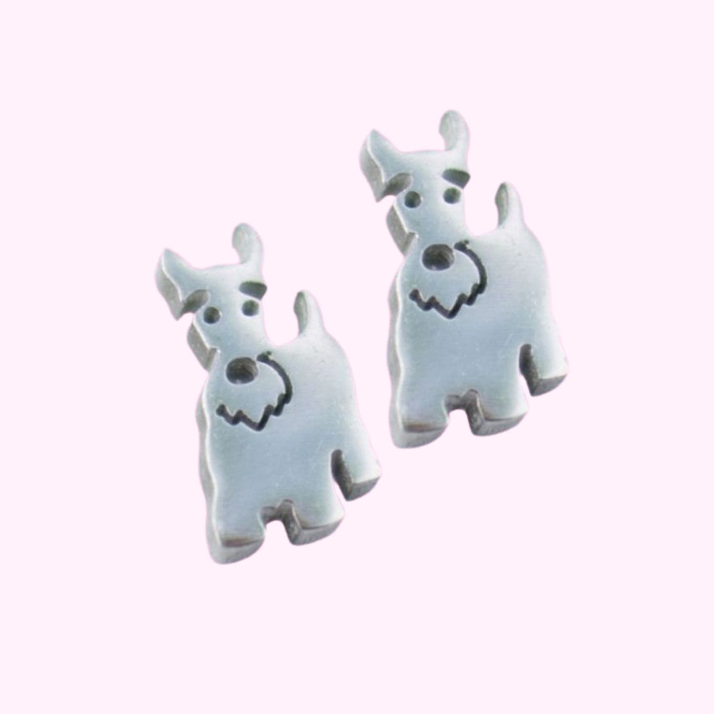 Pendientes pequeños con la forma de ideafix el perro de asterix snaucher mini o fox terrier de el corte inglés