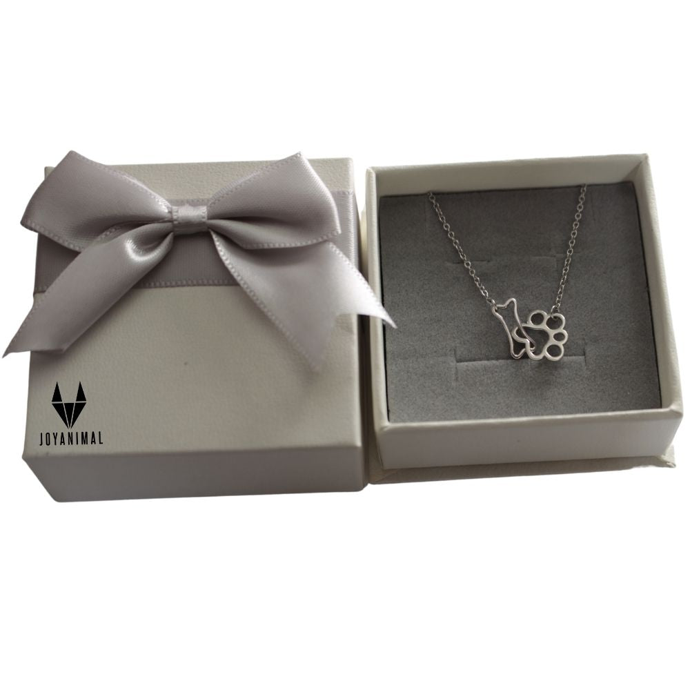 Pulsera de plata con hueso y pata canina en caja de regalo del corte inglés.