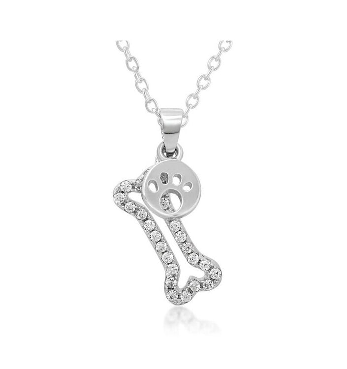 Colgantes de plata: un hueso de brillantes blancos y una huellita de plata de pandora