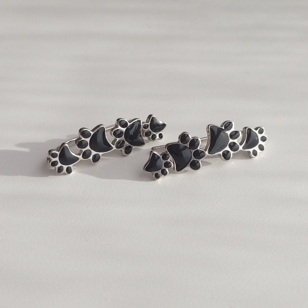 Pendientes colgantes cpon cuatro huellas de plata, ideal para mujeres. PANDORA
