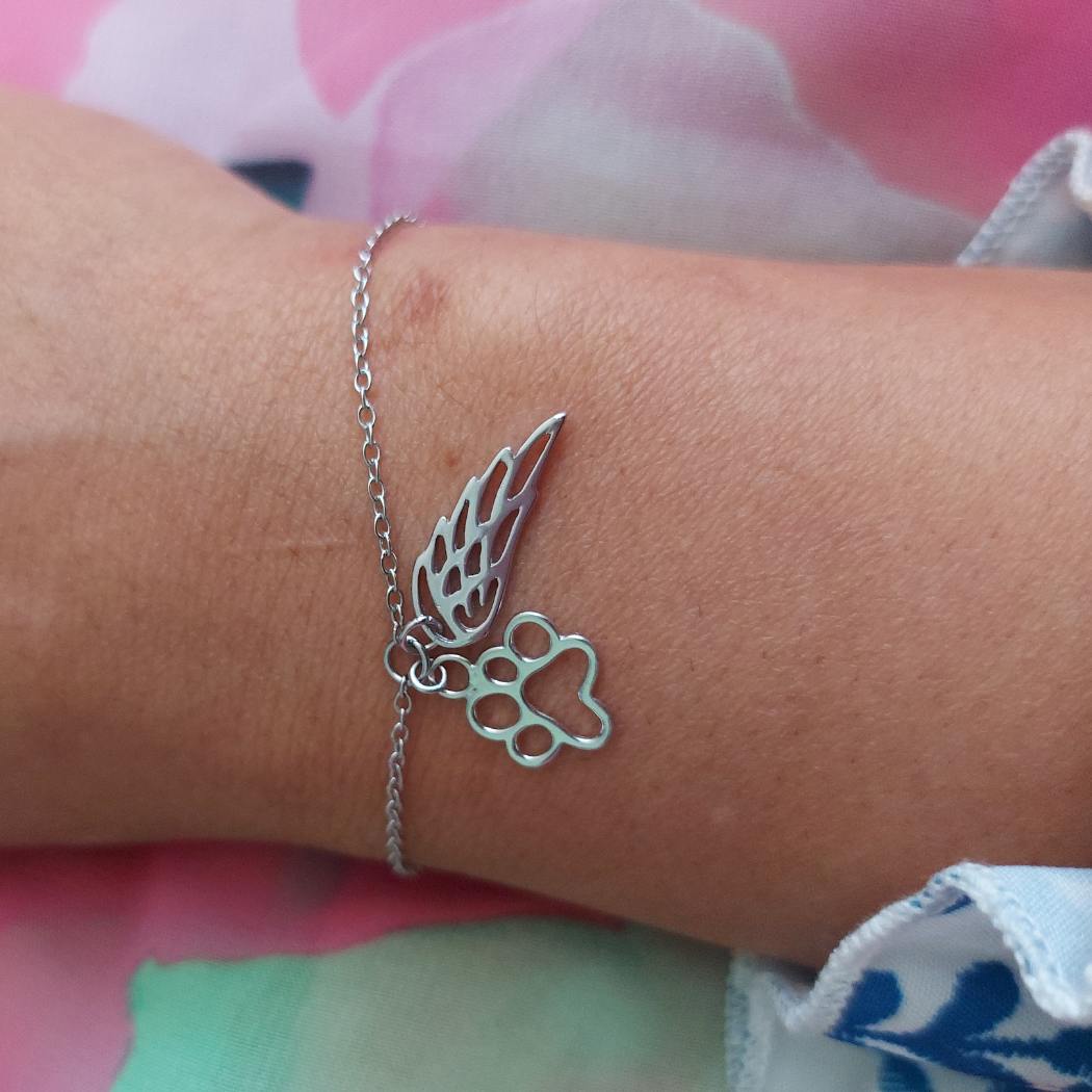 Pulsera para recordar a tu perro o gato huella y ala de plata. amor animal PANDORA